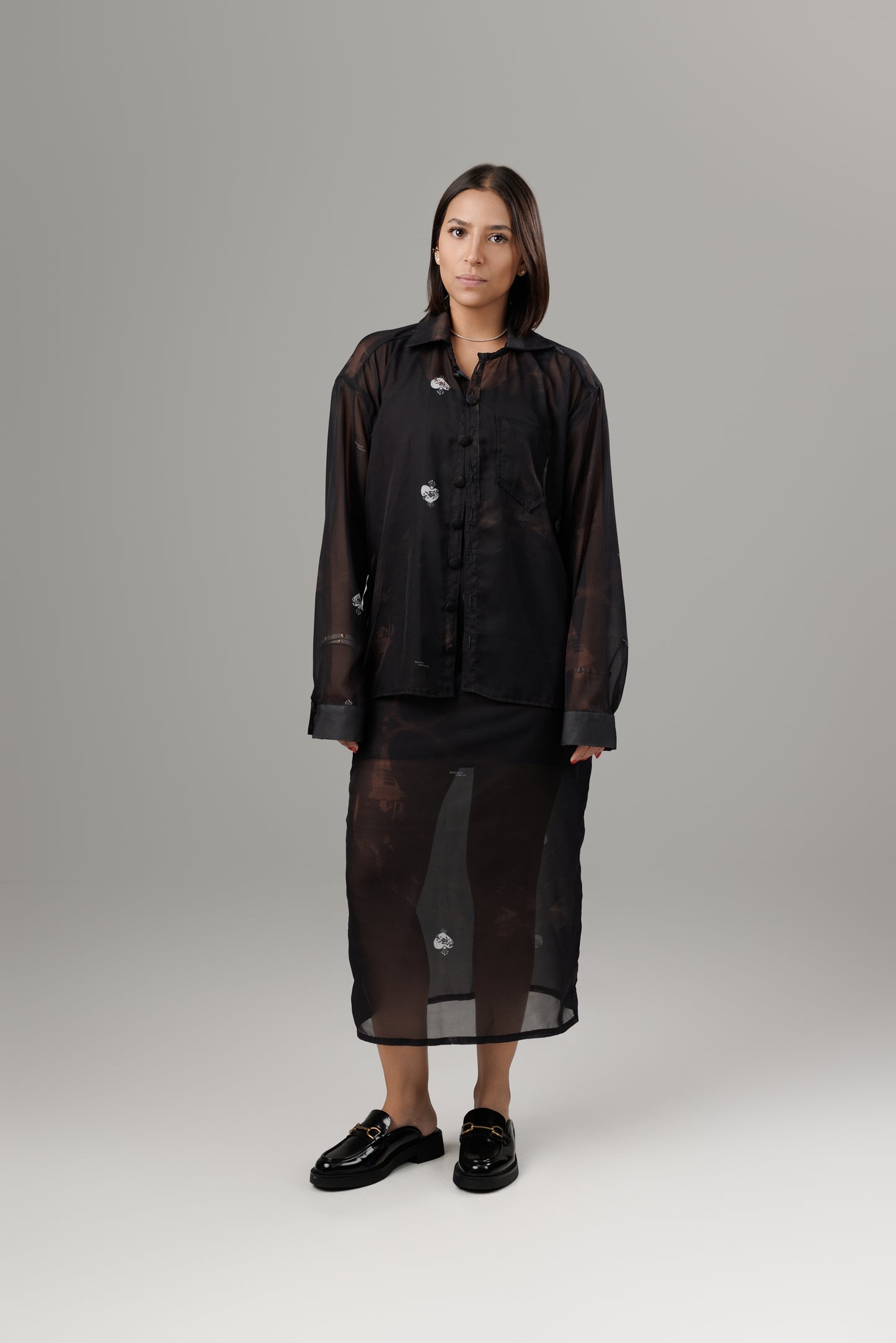 SOMBRAS DE FUEGO TRANSPARENT MIDI SKIRT