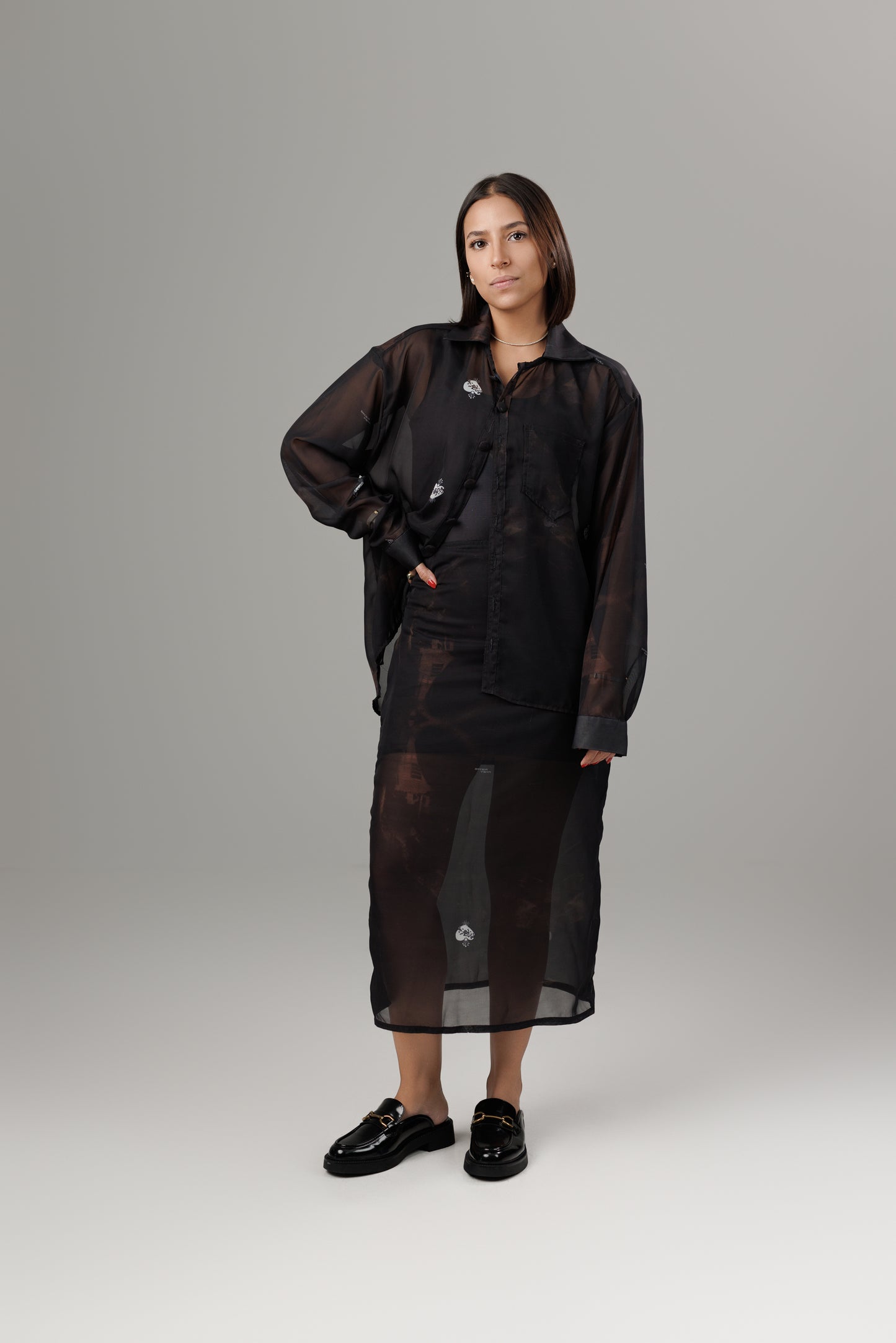 SOMBRAS DE FUEGO TRANSPARENT MIDI SKIRT