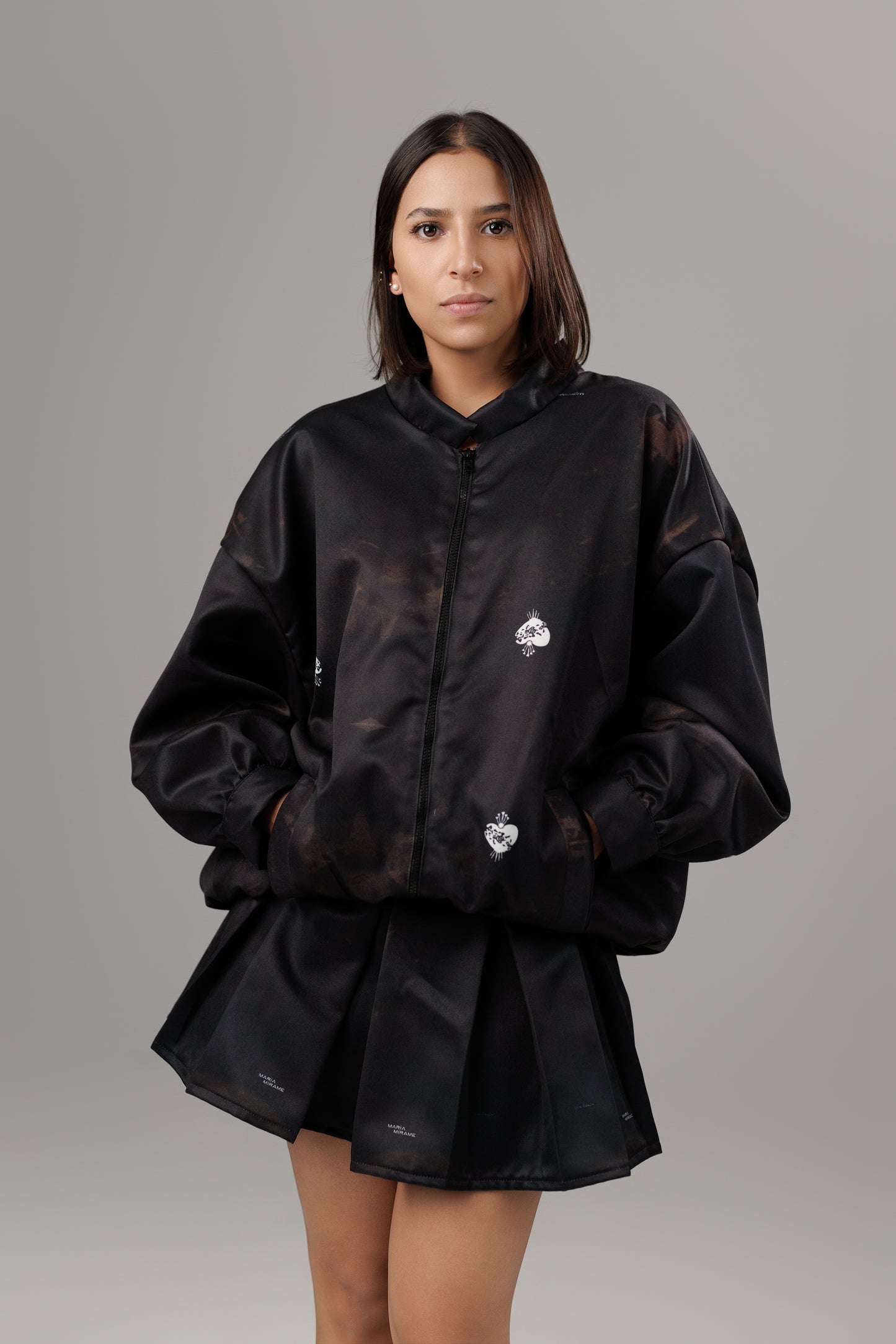 SOMBRAS DE FUEGO MINI PLEATED SKIRT